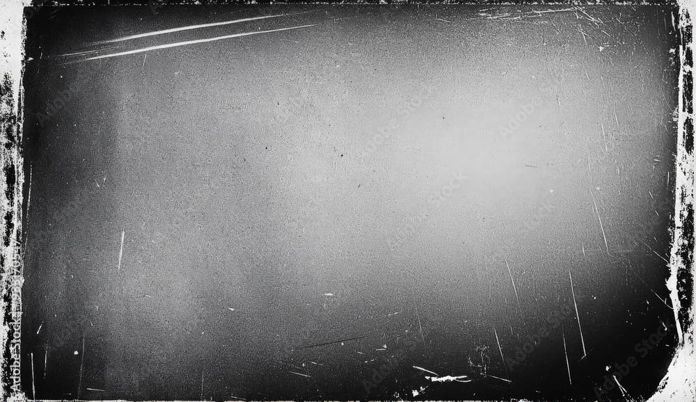 Obraz premium Black and white grunge textured background with scratches and white borders.