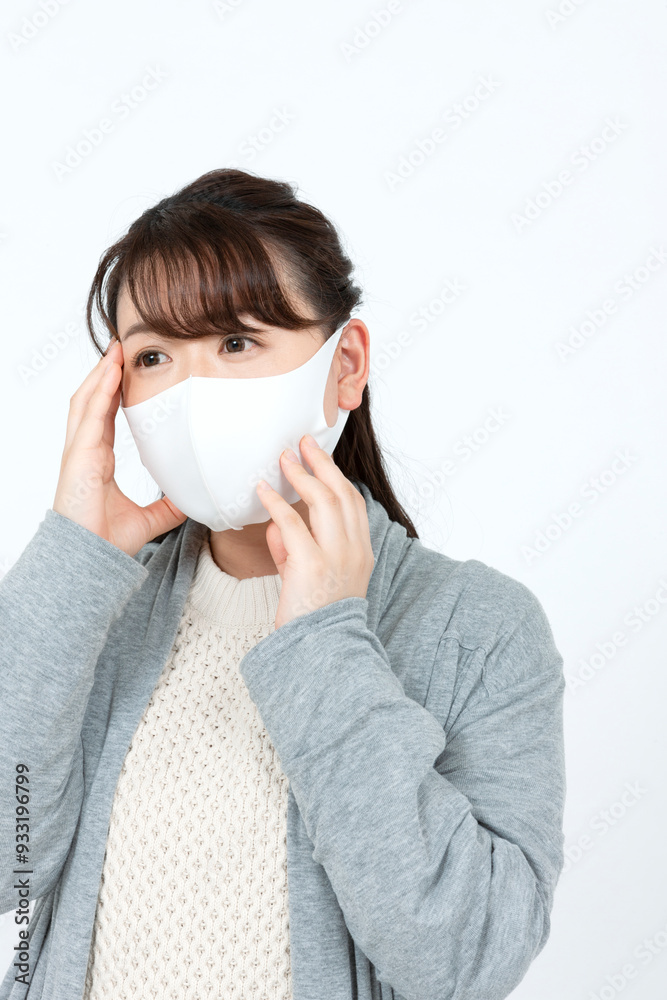 マスクを着けた女性 マスクを着けた女性
