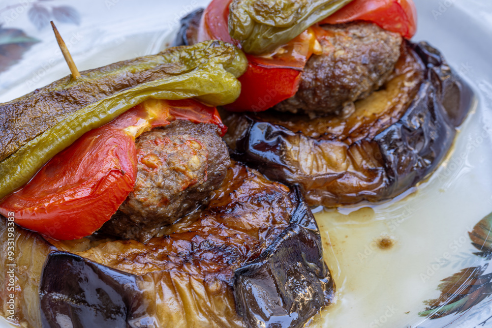Traditional delicious Turkish food; Kofte kebab wrapped in eggplant (Turkish name; Islim - islim kebabi or kurdan kebabi)