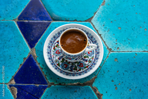 Turkish Coffee Cup and Turkish Delight on the Background of Ottoman Tile Motifs, Eminonu Fatih, Istanbul Turkiye (Turkey) photo