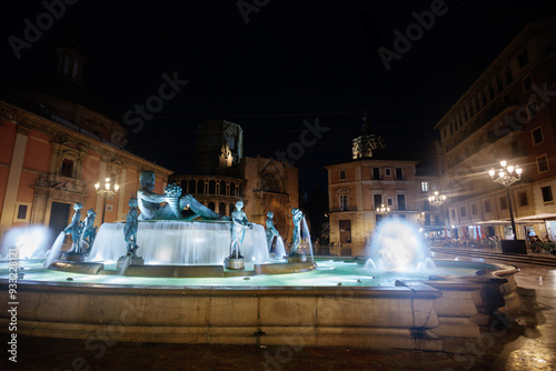 Font del Turia old fountain in night city of Valencia, Spain