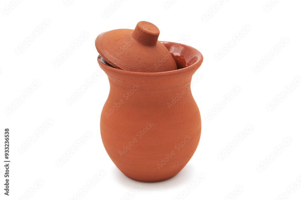 Clay pot with lid isolated on white background. Ceramic dishes for storing honey, liquids and other products. Clay pot with lid isolated on white background. Ceramic dishes for storing honey, liquids and other products.