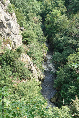 Cliffs And River Bode In The Bode Gorge - Bodetal In German language - In The Harz Mountains of Central Germany photo