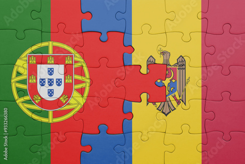 puzzle with the colourful national flag of moldova and flag of portugal .