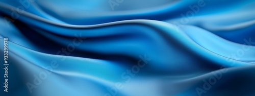  A tight shot of a blue fabric featuring a wavy pattern at its upper and lower edges