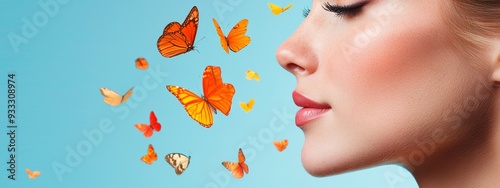  A woman's face in tight focus, her lips parted as if releasing a swarm of butterflies against a backdrop of tranquil blue photo