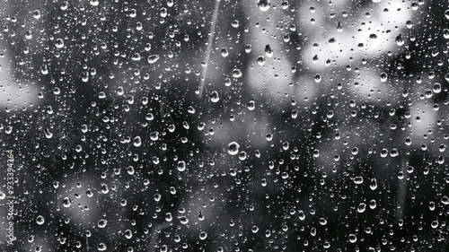rain falling on window surface 