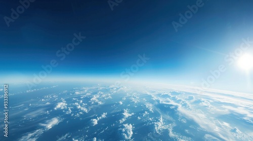 A breathtaking panorama of the sky from an airplane window, capturing the vastness of the earth from above