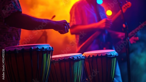 Percussionist playing conga drums in a live performance, with vibrant stage lighting
