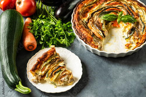 Vegetable tart with zucchini, eggplant and carrots. Pie with baked vegetables.