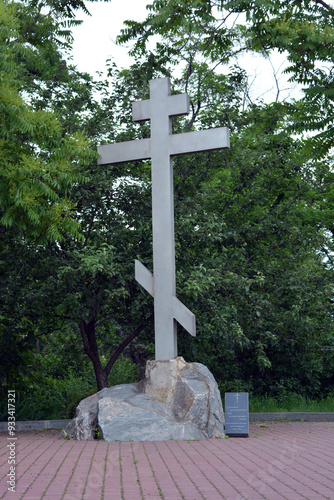 Beautiful and historical places, a cement Orthodox cross near the Church of St. Nicholas on Monastyrsky Island in the revival of Orthodoxy in the Dnipropetrovsk region.  photo