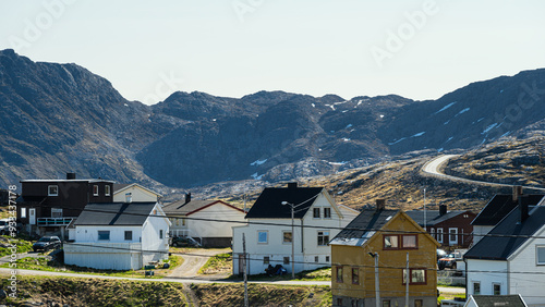 view of the village of Gjesvaer during a sunny spring day, north Cape, mageroya island, Norway photo