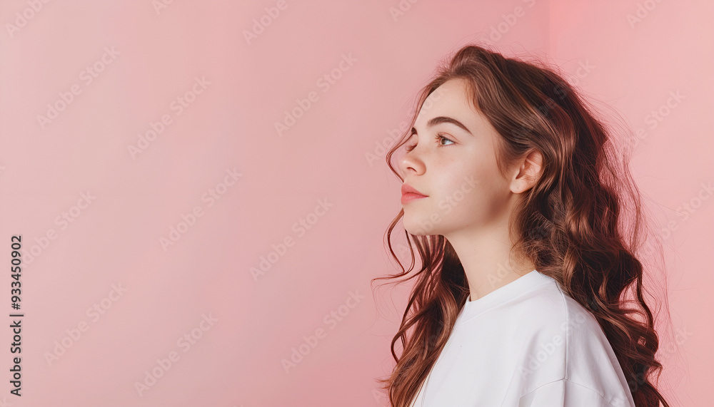 Fototapeta premium Young woman with healthy hair on color background