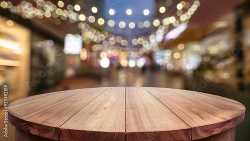 Tampo de mesa de madeira redonda vazio em fundo abstrato de luzes de de um bar desfocadas, fundo para uso em montagem de produtos para venda. photo