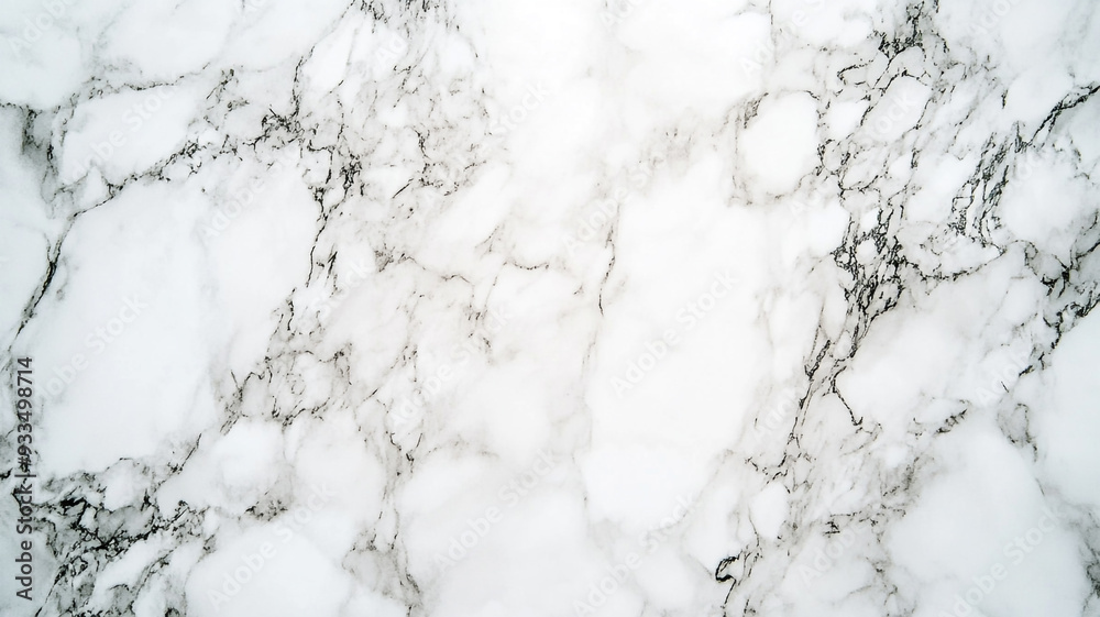 Elegant white marble surface with subtle gray veining in a soft, natural light setting Elegant white marble surface with subtle gray veining in a soft, natural light setting