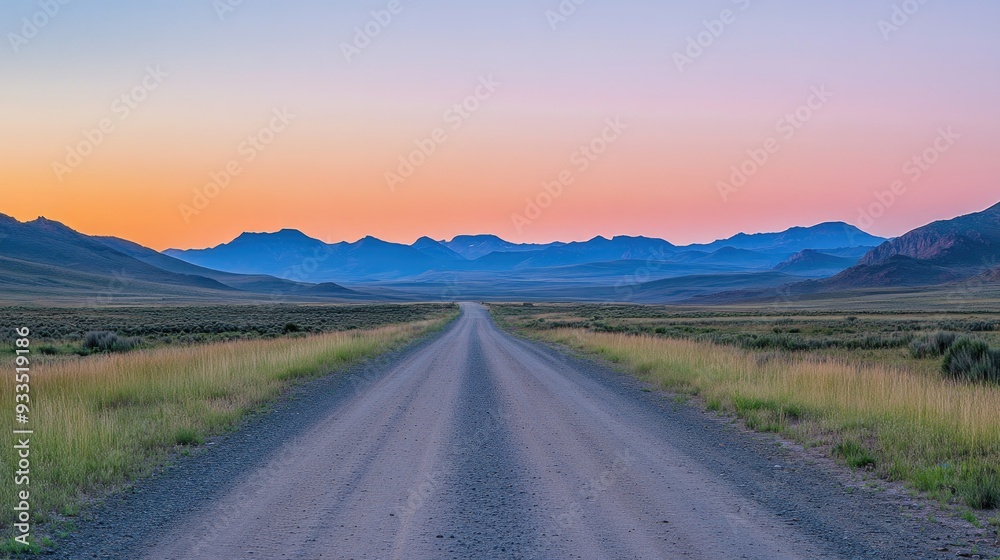 A peaceful landscape with a straight road heading towards distant mountains, with a clear, vibrant sky. A peaceful landscape with a straight road heading towards distant mountains, with a clear, vibrant sky.