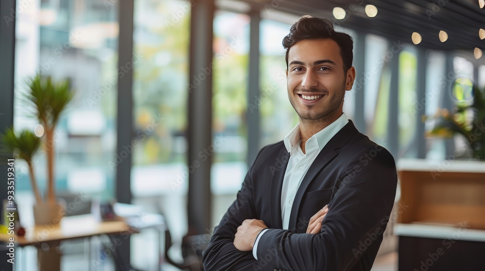 Businessman with arms crossed, smiling at the camera in a contemporary office, realistic photo quality. Businessman with arms crossed, smiling at the camera in a contemporary office, realistic photo quality.