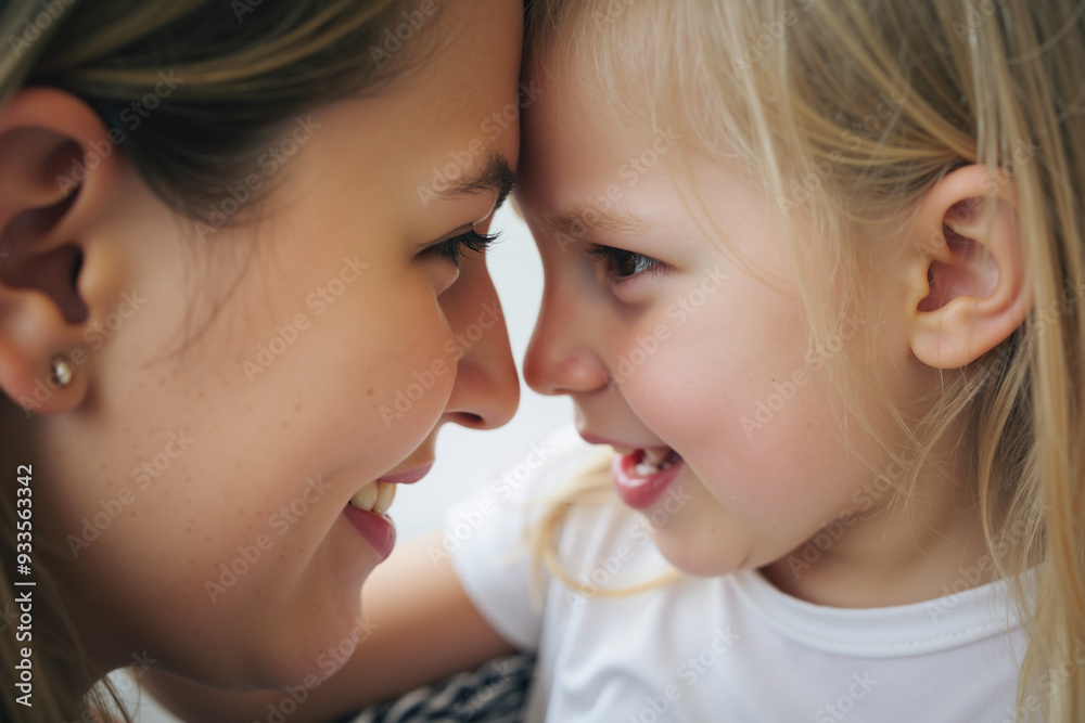 Tender Mother-Daughter Moment: Forehead Touch Symbolizes Love and Trust. Perfect for Family-Oriented Campaigns Tender Mother-Daughter Moment: Forehead Touch Symbolizes Love and Trust. Perfect for Family-Oriented Campaigns