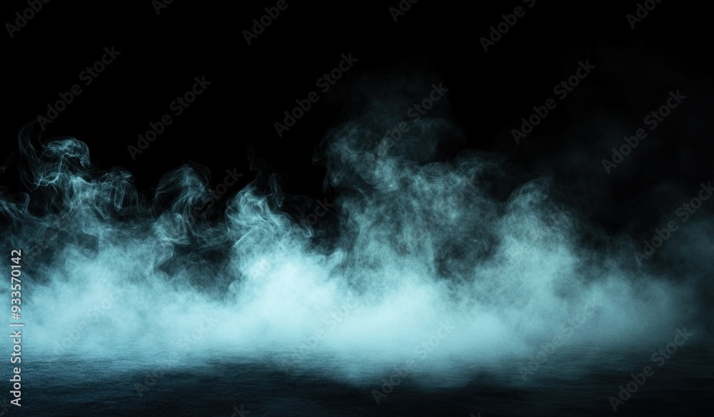 Abstract white smoke on black background creating an atmospheric design texture Abstract white smoke on black background creating an atmospheric design texture