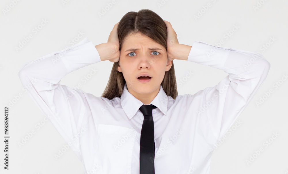 Photo of shocked afraid cute girl open mouth hands head wear white shirt isolated white background Photo of shocked afraid cute girl open mouth hands head wear white shirt isolated white background