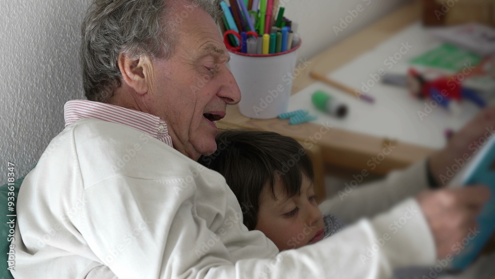 Grandfather and young grandson reading a comic book together, emphasizing the bonding and shared joy of storytelling in a cozy home environment Grandfather and young grandson reading a comic book together, emphasizing the bonding and shared joy of storytelling in a cozy home environment