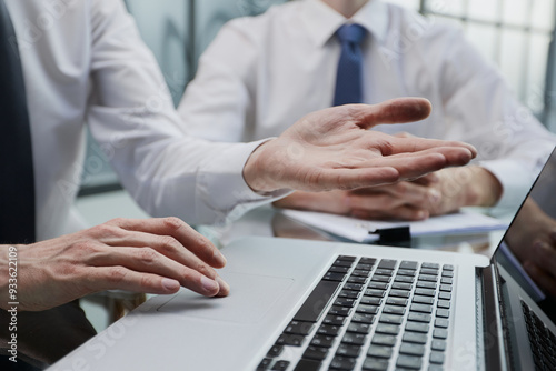 close up. two business men sitting at an office Desk