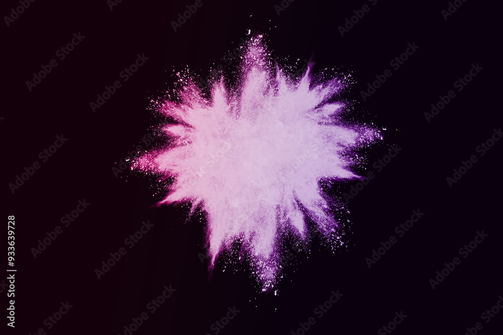 Explosion of colored powder and dust smoke splash pink and purple on black background Explosion of colored powder and dust smoke splash pink and purple on black background