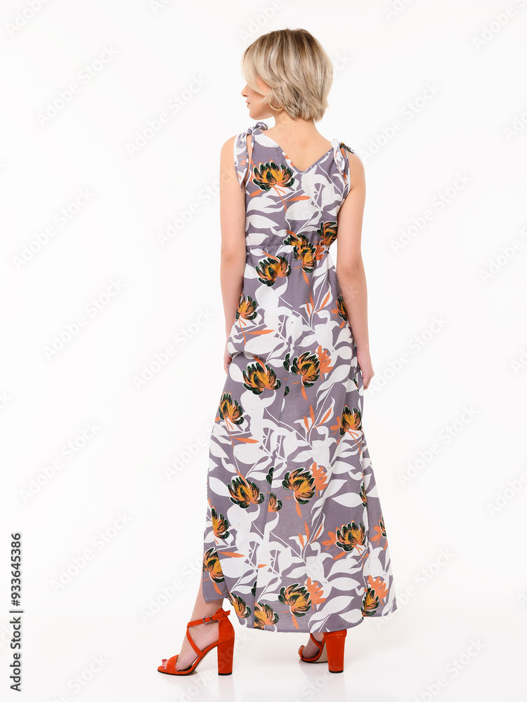 pregnant girl in casual clothes, in the studio on a white background.