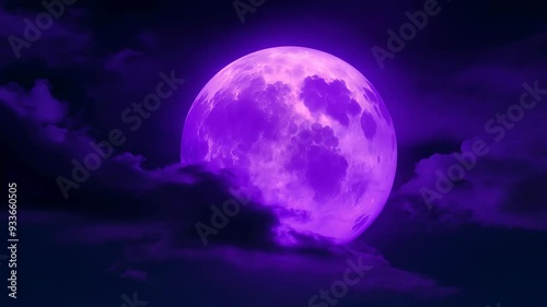 Purple full moon against the night sky surrounded by clouds