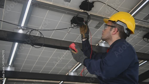 Engineer technical service checking solar panel with electricity meter for check the voltage, checking the system work properly