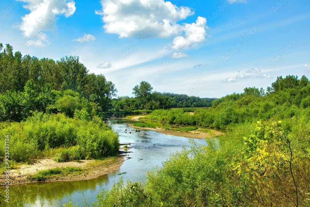 Sunny Summer day landscape of a small creek winding through forests and fields in Northern Illinois. Sunny Summer day landscape of a small creek winding through forests and fields in Northern Illinois.
