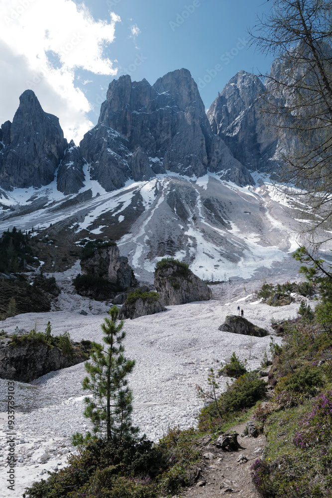 Obraz premium Trail pathway at Santa Maddalena Landscape at Val di Funes, land of the pale mountains and valley in the Dolomites, UNESCO World Heritage- South Tyrol, Italy