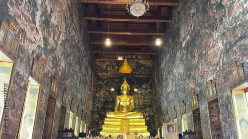 Big golden Buddha statue is enshrined at Ratchabophit Sathit Maha Simaram Ratcha Wora Maha Wihan Temple photo