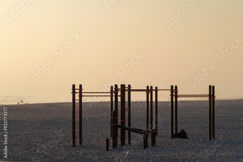 Sunset in Arica, Chinchorro beach, the sun slowly sets between the clouds, on a winter day