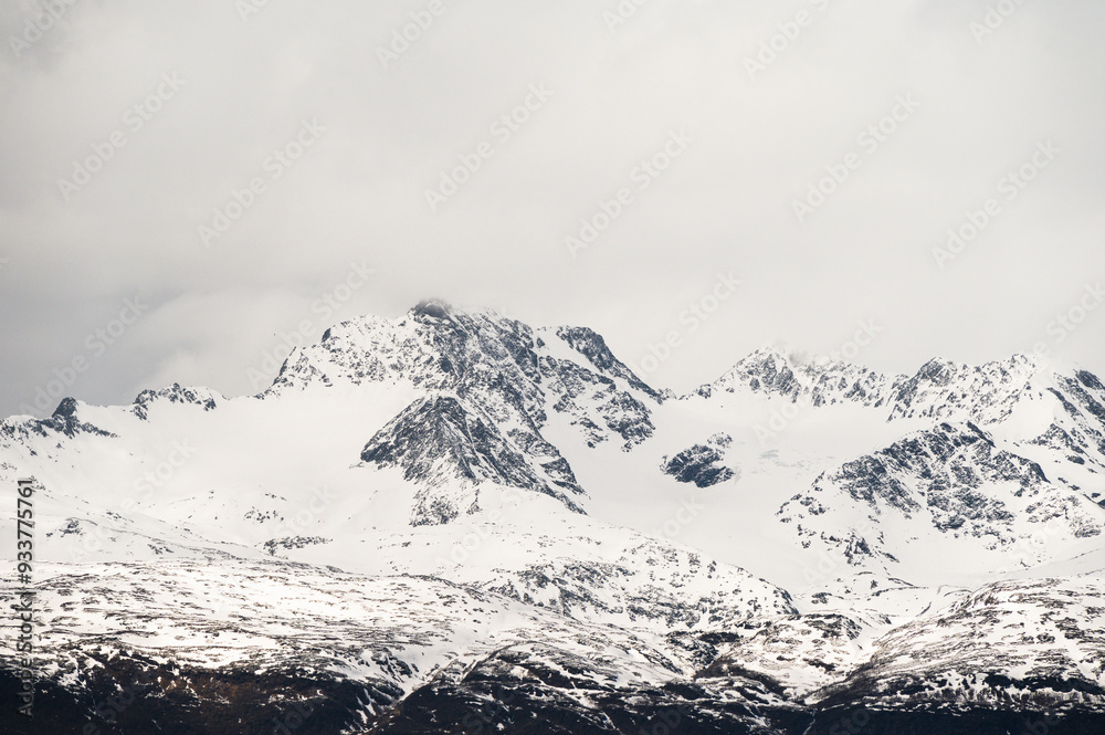 snowy landscape with snow-covered mountains along the road from Alta to Tromsoe, Norway