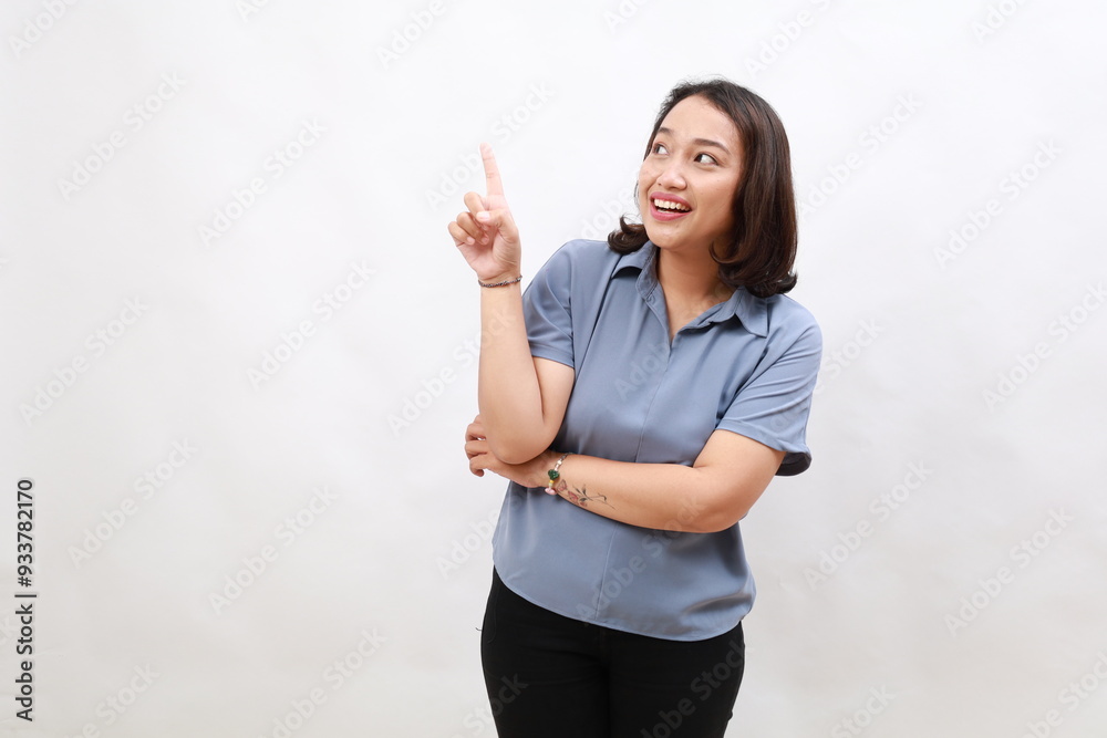 Young smart asian girl has an idea, raising finger up, sharing her plan, pointing on top, standing over white background Young smart asian girl has an idea, raising finger up, sharing her plan, pointing on top, standing over white background