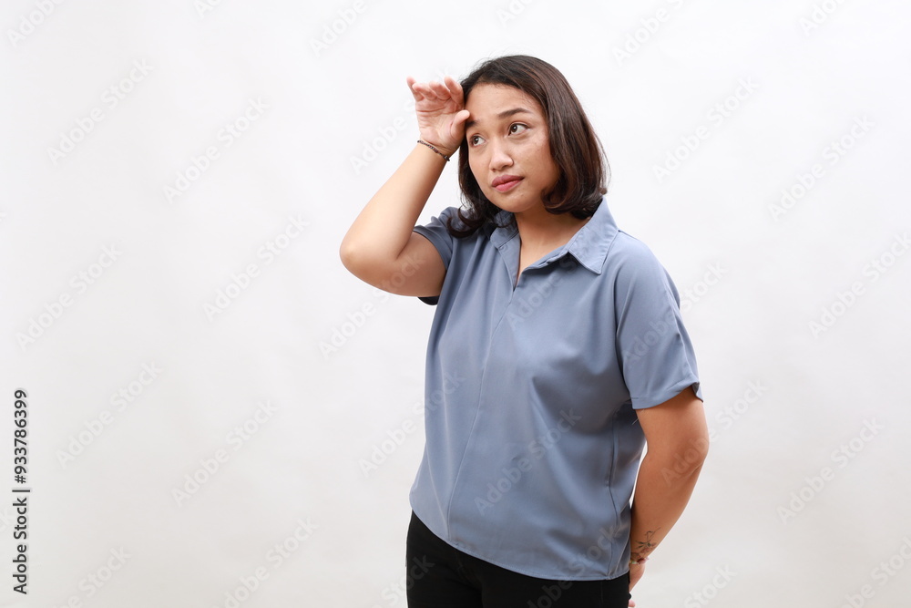 Bothered and tired asian woman, looking complicated, slap forehead, face palm sign and grimacing upset, looking distressed at camera, white background