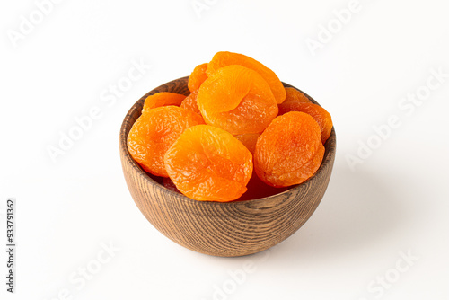 Fotografie Dried apricots in a bowl. Dried fruits.