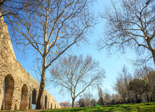 Aqueduct of valens (bozdogan kemeri) of Roman empire and trees under blue sky, constantinople, unkapani istanbul