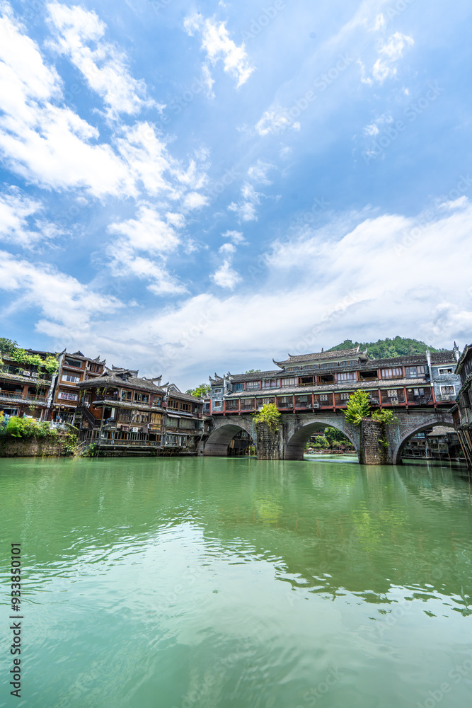Green Water and Traditional Miao Village Architecture by the River in Fenghuang Ancient Town, Xiangxi, Hunan Green Water and Traditional Miao Village Architecture by the River in Fenghuang Ancient Town, Xiangxi, Hunan