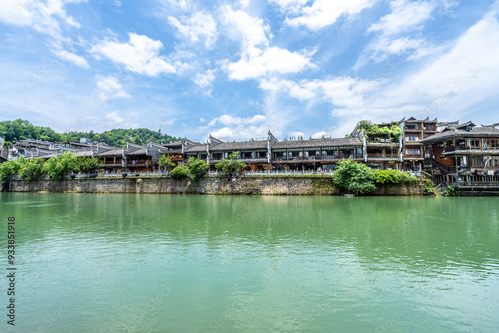 Green Water and Traditional Miao Village Architecture by the River in Fenghuang Ancient Town, Xiangxi, Hunan Green Water and Traditional Miao Village Architecture by the River in Fenghuang Ancient Town, Xiangxi, Hunan
