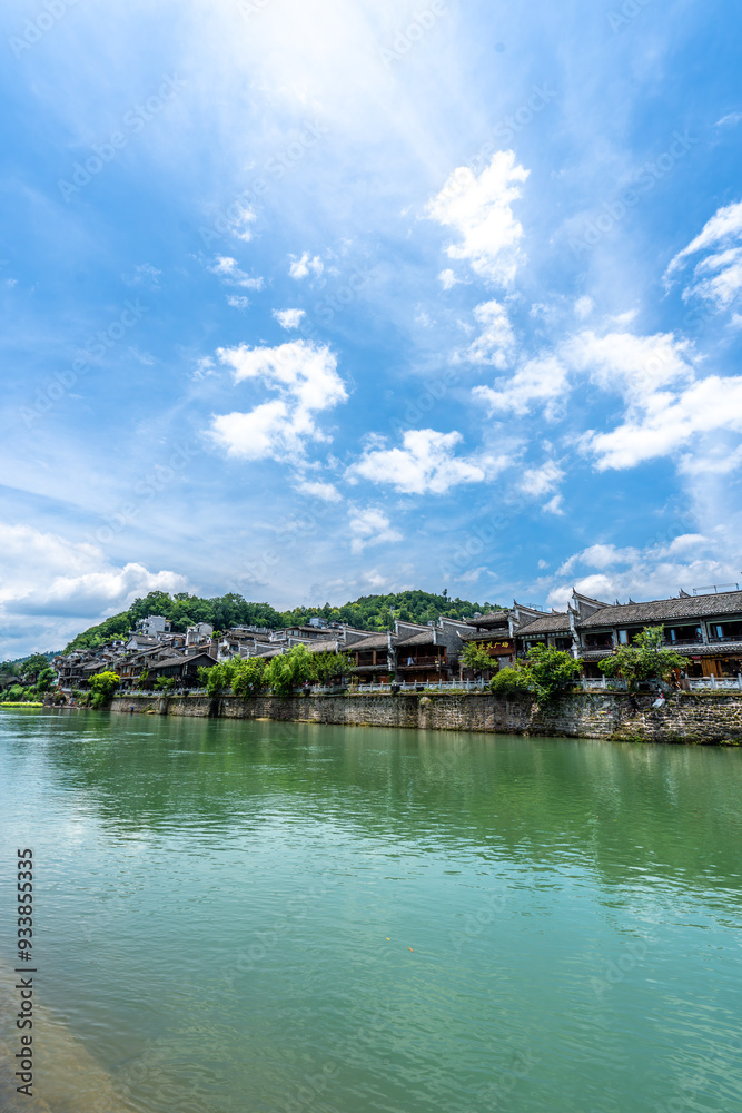 Green Water and Traditional Miao Village Architecture by the River in Fenghuang Ancient Town, Xiangxi, Hunan Green Water and Traditional Miao Village Architecture by the River in Fenghuang Ancient Town, Xiangxi, Hunan