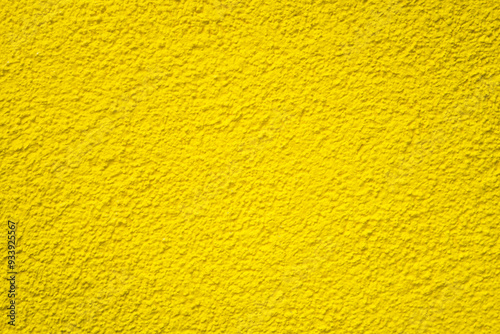 Yellow textured surface, yellow wall backdrop