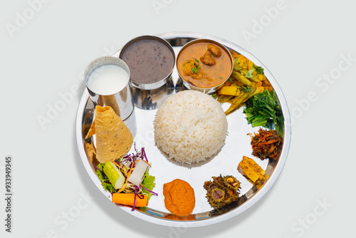 Nepali Meal of Daal Bhaat Tarkari Thakali Thali  Meat Rice vegetables and pickle dhido meal dinner or lunch photo