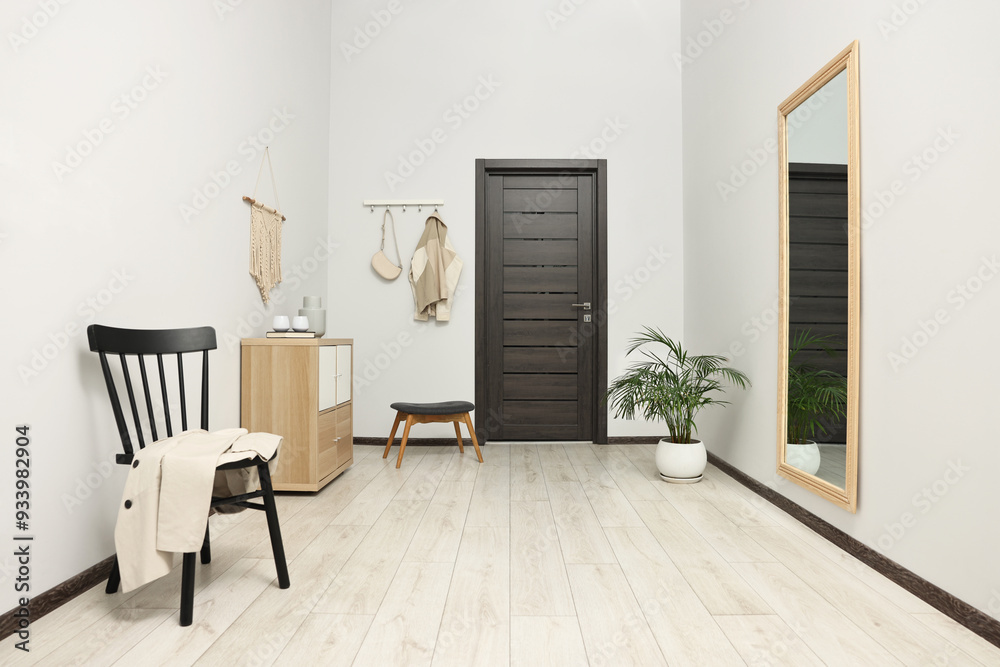 Stylish hallway with big mirror and chest of drawers. Interior design Stylish hallway with big mirror and chest of drawers. Interior design
