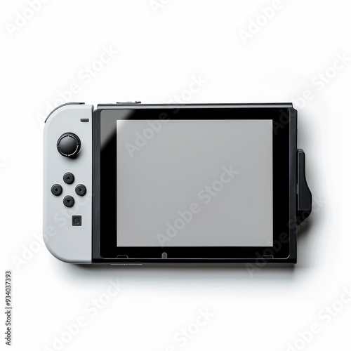 A gray and black video game console with a blank screen, isolated on a white background. The console is a popular choice for gaming on the go.