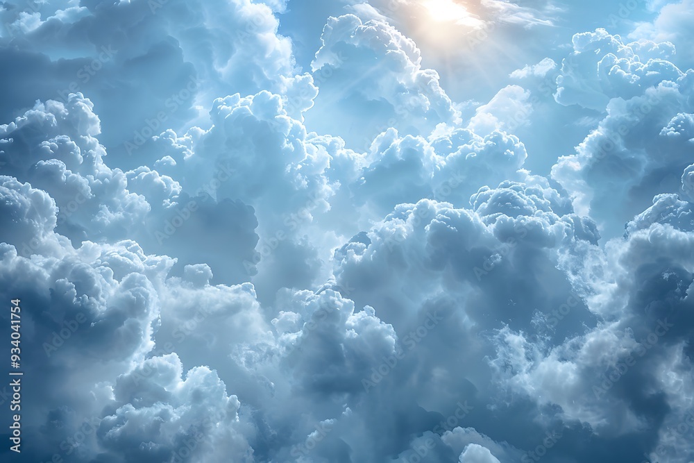 Fototapeta premium Serene Sky: A Majestic View of Fluffy Clouds Illuminated by Sunlight