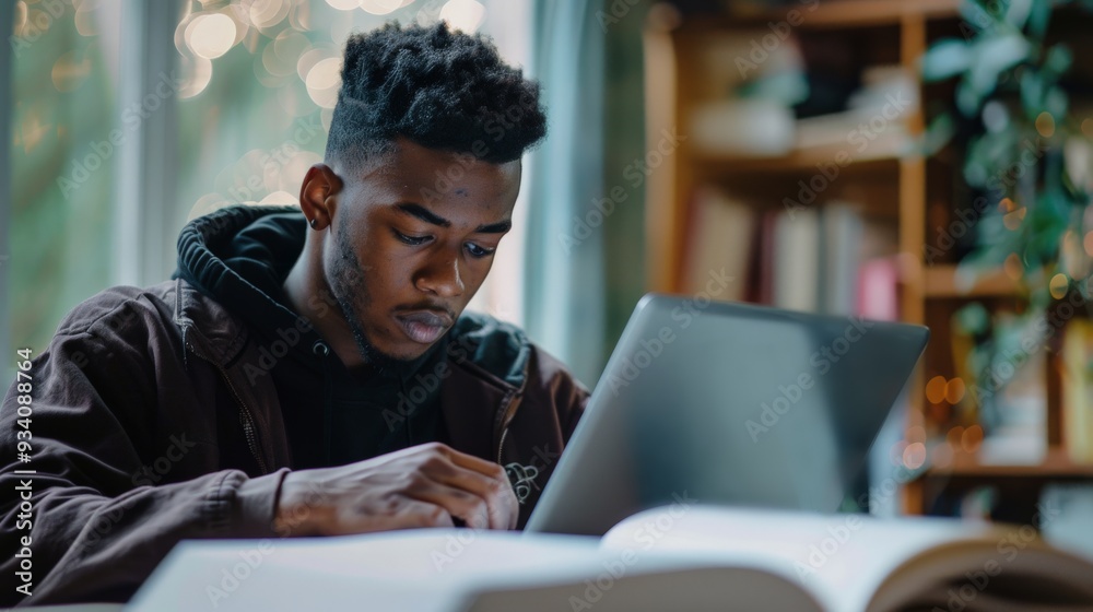 Young Man Studying at Home.