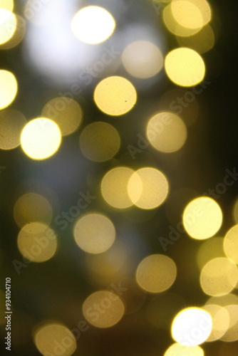 Golden bokeh lights shimmer softly in a blurred background, creating a warm and inviting atmosphere perfect for evening gatherings or festive celebrations