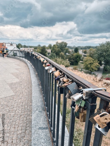 railing with padlocks photo